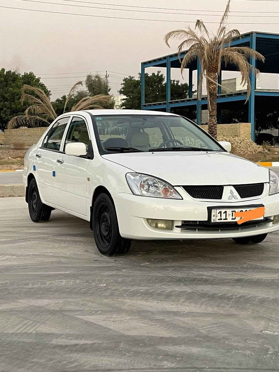 مرحبا لانسر موديل 2011  شركه العامه مكفوله كفاله عامه من صبغ وتبديل رقم بغداد دولي جديد بسمي شخصيآ محرك وكير وحداديه جديده مشيهه جدآقليل همkm 108  وسياره مكفوله كفاله بدون صبغ بدون تبديل وسونار كدامك تأكده منه سياره كلش حلوه  سعره 83$وبيه مجال بسيط انشالله للاتصال *********** رجا أأكد من سونار يله تتصل
