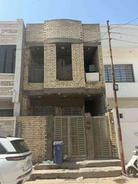 الدورة بغداد • ١٠٠م زراعي • وحدتين سكنية