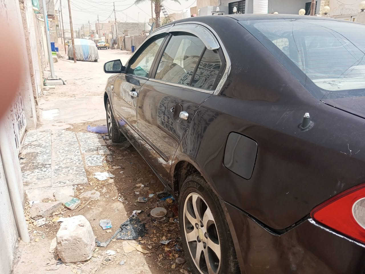 كيا اوبتيما 2006 خليجي
مكينه الفين دوش ستوني شادها وعلى ايدي لاتبخير ولاتنقيص 
كير اوتماتيك ستوني شاده وي المكينه 
وعقل جديد 
شاشه وكاميرا 
داخل بيجي 
وارضيه جلد
مصبوغه عام 
سنويه باسمي 
السياره مال جناي محتاجه شويه ترتيب للحداديه وبوليش 

مكان السياره نجف 
السعر 83 
غير متواجد على الفيس 
هذا رقمي ***********
