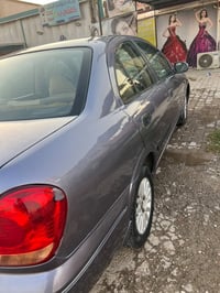 نيسان سني • ٢٠٠٤ • ١٦٠٠