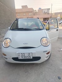 QQ 2011 كامله من كلشي السياره مال بنيه ماشيه 44الف حته الشامبو مال شرك...