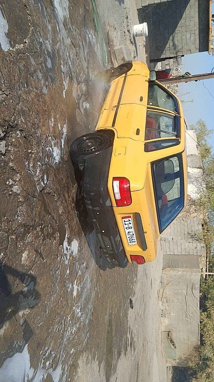 سياره موديل 12 تحويل ثاني يوم مصفره هياه وغرامات مكينه وكير خير من لله السعر 23ورقه مال جناي ***********المكان بغداد تبريد شغال منضومه جديده وتخم تاير للشارع
