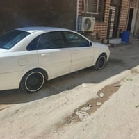 سيارة أوبتره مال مزاد وزاره داخليه مديل 14 رقم تلفون 07713514406