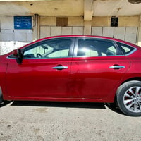 نيسان سنترا موديل  2019 لون ماروني  مواصفاتها معروفة SV السيارة بإسمي ...