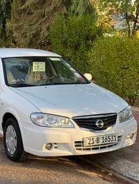 نيسان صني • ٢٠١٠ • ابيض