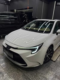 كورلا 2024 هايبرد شكل الامريكي  ماشية 28 الف كيلو متر حقيقي  مكفولة فق...