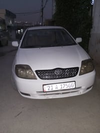 کرۆلا 2002  مەکینە بچوک گێڕ عادی  بەشەرتی گێڕ و مەکینە  تەکسی بووە کرا...
