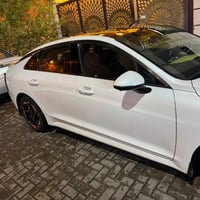 🔥 KIA K5 EX 2024 | خليجي | أعلى فئة 🔥 🤍 أبيض | 2.5 تنفس طبيعي 📍 الممشى...