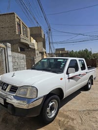 نيسان اربيل • انكليزي • نجف