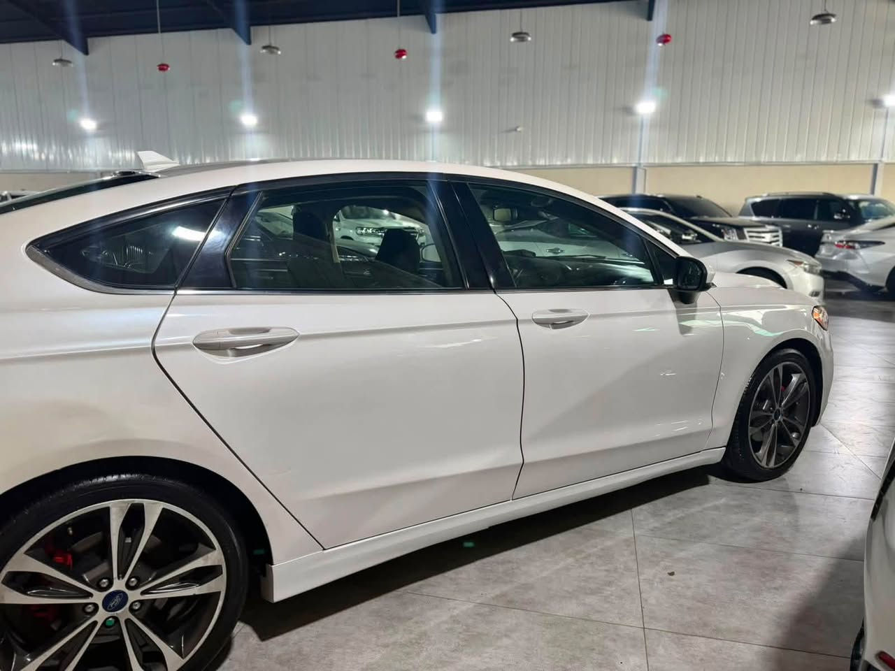 بسم الله الرحمن الرحيم
‏ FORD FUSION 2020 SE
فؤر فيوژن مؤديل 2020 مواسفات SE
ره نگى سبي سەدەف 
_____________________________________
شوين🌆 : سليمانى                  سعر:98
موبايل📲 : ***********
***********
_____________________________________
گير و مه كينه ى به شه رت نه كراوه ته وه
سه وت و سه رف و خه له لى نييه به شه رت
مه كينه 1.5 تؤربؤيه ئيكؤ بوست
_____________________________________
( دوو پارچه بؤياخه ) به بئ ناوگرتن 
زؤر جوان ماوه ته وه و نمونه يه له جوانيدا
_____________________________________
مواسفات
( به سمه - گير ڤؤليؤم - ناو زه رد - بريك هه وا - كؤدى ده رگا - ئؤتؤ ستؤپ - كوشنى هه ردولا كاره باى - كاميرا - ڤؤليؤم - تحديد سورعه  - لايت ليد - چوار جام ئؤتؤ - ويل كه پ -3 شاشەو شاشە گەورە)
_____________________________________
چوار تايه و ويلى تازه ى بؤ به ستراوه و يه ك دينار مه سروفى نييه
سه نه وي تازه يه تا. ٢٠٢٩
ته حويل و غه رامه به شه رت 
::: گير و مه كينه و كاره باى و هه موو گيانى به شه رت :::
_____________________________________
