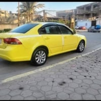 اوبتيما ٢٠٠٩ • مكينة ٢٠٠٠ • رقم انكليزي