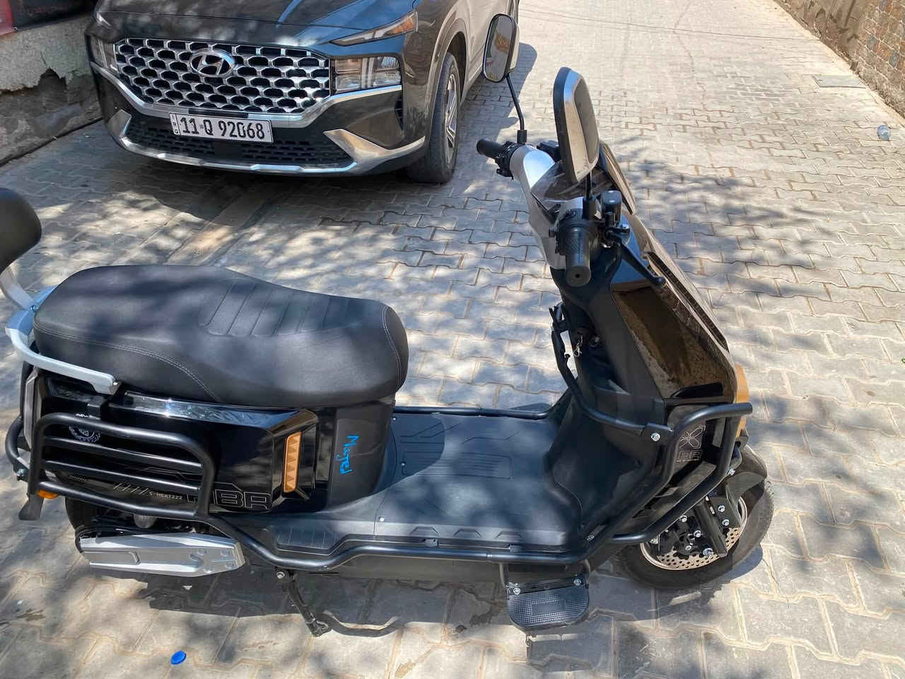 دراجه شحن فول فول مواصفات حتى ما نع انزلاق بيها اربع سرعات رجوع الخلف نمرت البك ٦ بطاريات شاشه دجيتل 

سعرها مليون ٢٠٠ جديده شخط ما بيها صار شهرين من اخذتها 

مكاني بغداد سبع قصور 
***********
