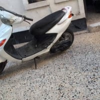دراجه ناريه تكروز  كلشي كهربائيه زينه بس عطلها مكينه السعر 125 وبيها م...