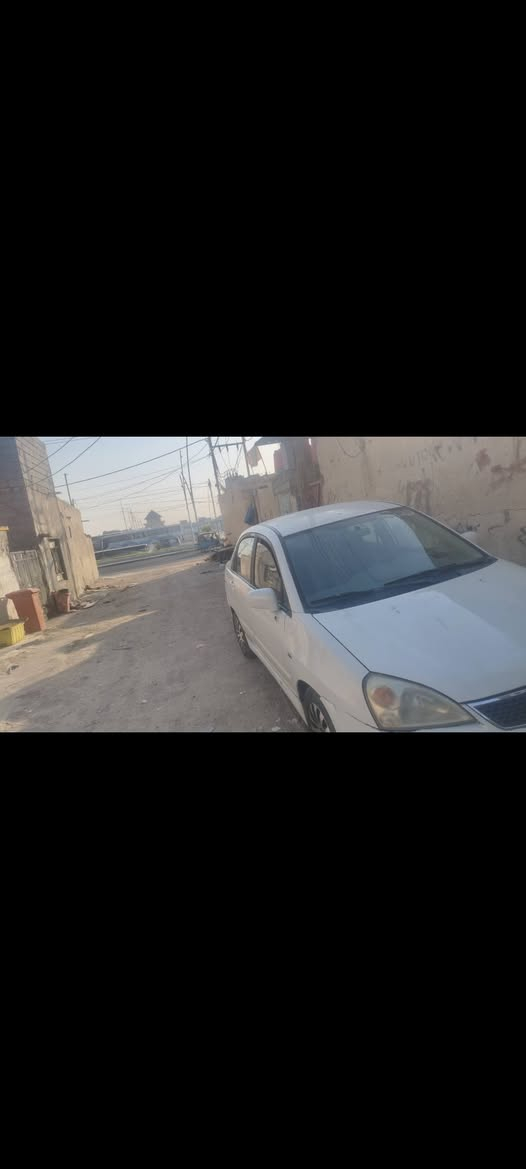ساسوكي ليانا 2005 مكينه كير تبريد جاهزه مابيها اي نقص مكفوله من ضربه اصوليات سياره جديده بصره نكليزي مكينه الف و800 قايشين
