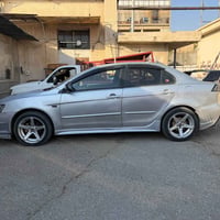 لانسر قرش • ٢٠٠٨ • مجددة لغاية ٢٠٣٠