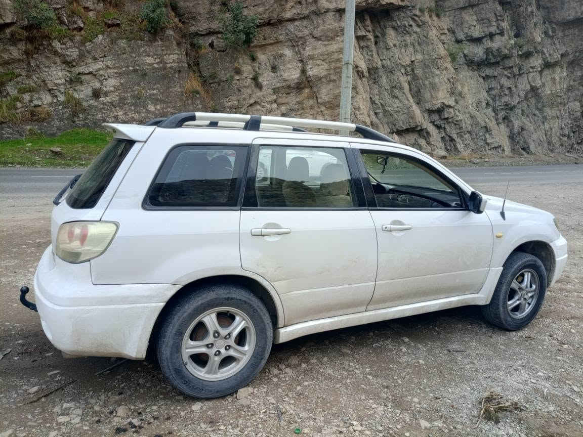 اوتلاندر ٢٠٠٣ • دبل اكسل AWD • اوتوماتيك