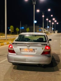 كامري 2004 خليجي للبيع منضومه غاز وبانزين  تبريد تدفئ ثلج  صبغ حزام بد...
