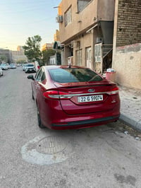 فورد فيوجن 2018 se1500 السيارة فول بدون فتحة وصورة الحادث موجودة 07826...