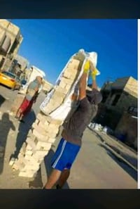 الناصرية • عمال تصعيد وتدخيل • مواد بناء