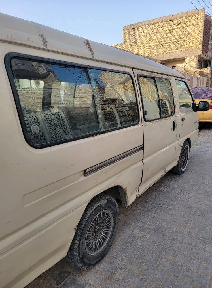 باص ١١ راكب • ٢٠٠٢ • رقم النجف