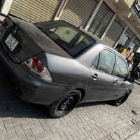 للبيع لانسر 2010 خليجي رقم بغداد انكليزي سياره حلوه و جاهزه تايرات بات...