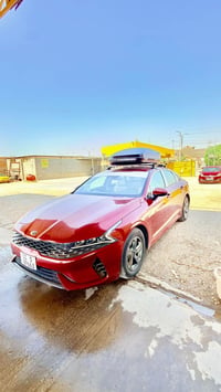 قطعتين فقط KIA K5. LXS ٢٠٢١ أمريكي   رقم بغداد حرة باسمي   _اللون مارو...