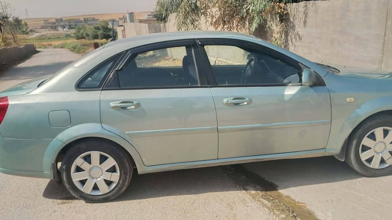 اوبترا 2006 • كير اوتو • صبغ قطعتين