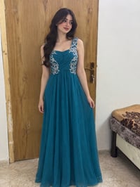 فستان جديد ملبوس مره  يلبس قياس xl  للتوصل 07708878029 السعر:25