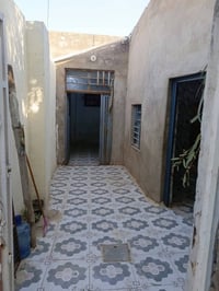 النجف الاشرف • ١٠٠م • غرفتين
