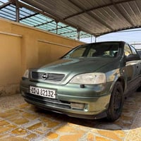 استرا 2002 • صبغ عام • گير عادي