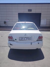 +964 771 611 7558  سيارة لانسر ٢٠١٠ رقم كربلاء محرك ٢٠٠٠ كير اوتماتيك ...