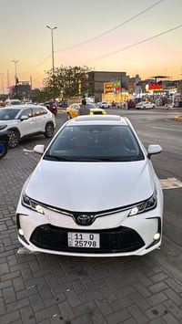 كورلا 2024هايبرد  رقم بغداد ب اسمي  ممشه السياره 35 السياره فول مواصفا...