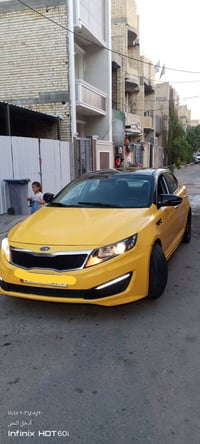 للبيع أو مراوس  كيا اوبتيما 12 رقم بغداد انكليزي  موصفات نص فول  سياره...