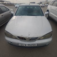 نيسان بريميرا • ٢٠٠١ • رقم بغداد