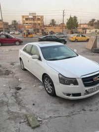 جيلي ام كراند ec8  حجم الكبير  موديل 2013 صبغ باب امامي وخلفي ايمن  مح...