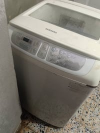 غسالة شغالة للبيع السعر 50 الرقم 07832659430