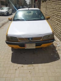 بيجو لميس • كير • بغداد
