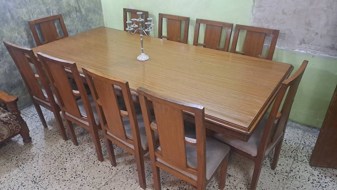 ميز طعام ١٠ كراسي ملكي خشب صاج بورمي شغل عراقي بدون اي ضرر الاتصال ***********
