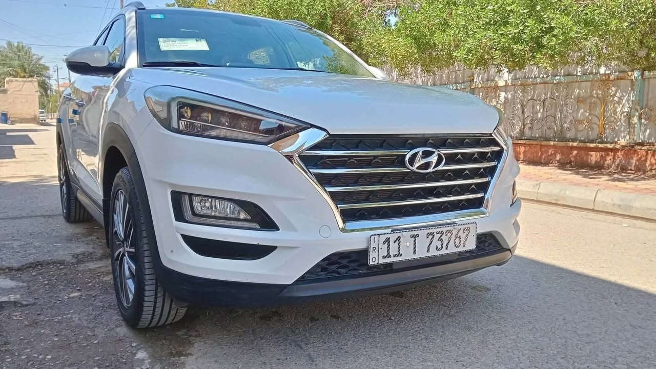 السلام عليكم توسان خليجي ٢٠١٩رقم بغداد الدولي الجديد بااسمي تحويل ثاني يوم مكفولة كفالة عامة من الصبغ والتبديل والحالوب وكير ومحرك وضع الشركة فول موصفات 
حساس امامي حساس خلفي خمس عدسات بصمة تشغيل بصمة ابواب محرك ٢٠٠٠دوش كشنات الامامية كهربائية وكامل التفاصيل فقط تكشر بسيط بيه وكما موضح بالسونار امامك للاستفسار اتصل على الرقم *********** مكان السيارة ديوانية

