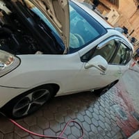 كارنز ٢٠١٣ • محرك ٢٠٠٠ • رمادي