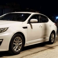 أوبتيما 2014 • مكينة 2000 • وارد كوري