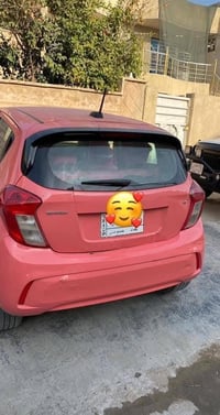 للبيع سياره لون وردي نوع سبارك شوفرليت وارد امريكي اربع ابواب نظيفه جد...