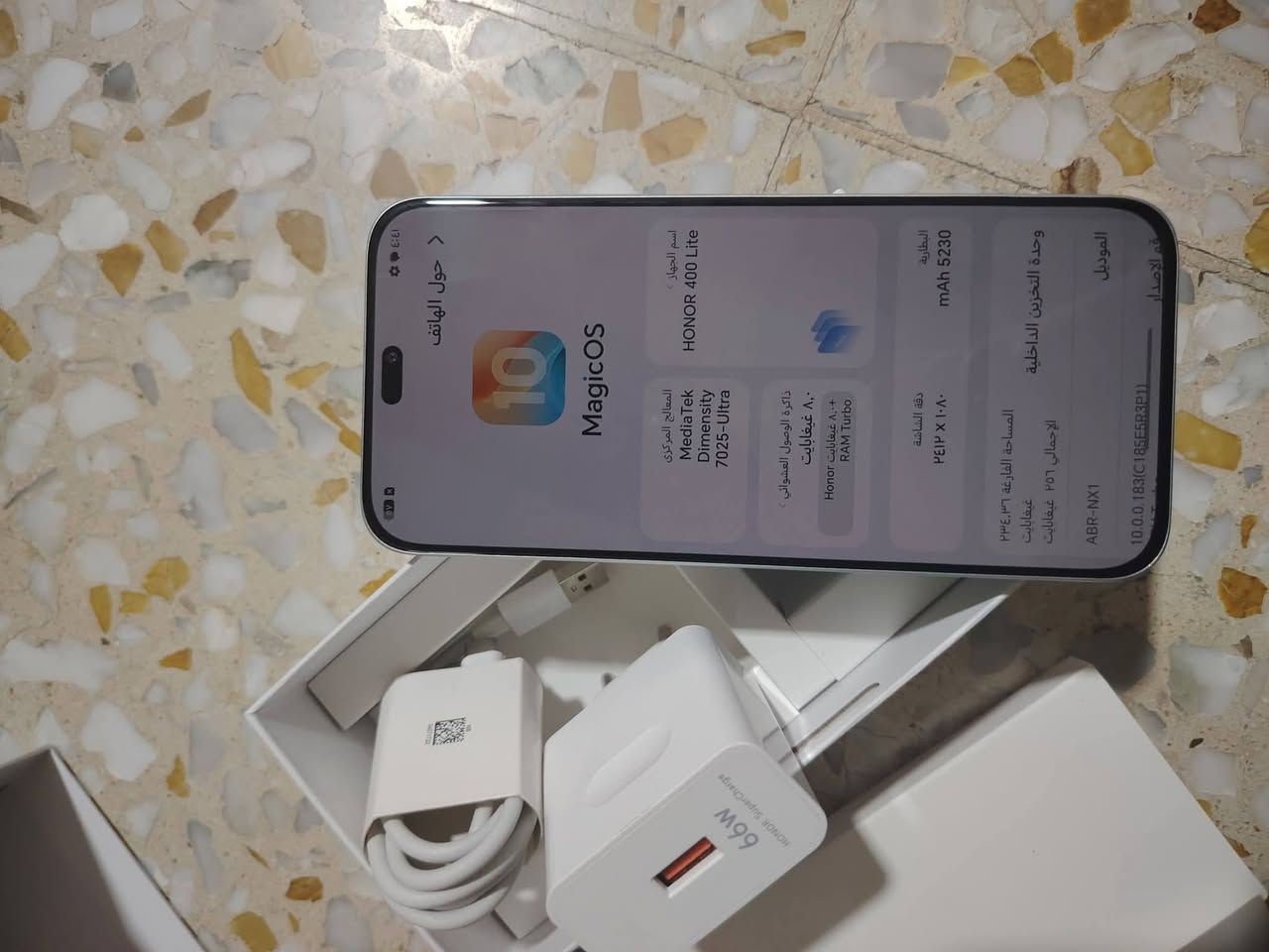 هونر 400 لايت السعر 350 العنوان موصل ايمن رقم الهاتف التواصل واتساب 
فقط***********

نص مكتوب في الصور:
- ٤:٤٣ حول الهاتف MagicOS 10 اسم الجهاز HONOR 400 Lite المعالج المركزي MediaTek Dimensity 7025-Ultra ذاكرة الوصول العشوائي ٨+٨ غيغابايت Honor RAM Turbo دقة الشاشة ٢٤١٢ × ١٠٨٠ البطارية ٥٢٣٠ mAh وحدة التخزين الداخلية المساحة الفارغة ٣٦,٢٣٤ غيغابايت الإجمالي ٢٥٦ غيغابايت ABR-NX1 رقم الإصدار 10.0.0.183(C185E5R3P1)