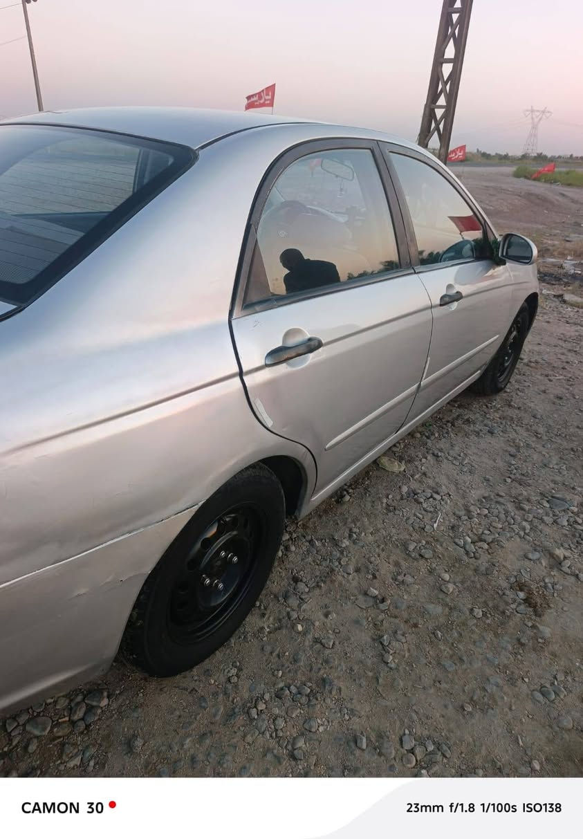 سلام عليكم  كيا سبكترا 2008 رقم نكليزي ادياله وارد امريكا طختين بل جاملغات الخلفيه بس السياره تبريد ثلج دوشمه السياره مرشوشه سبب الجراد ولباقي كفاله تحويل مباشر السعر 69 بيها مجال رقم ***********
