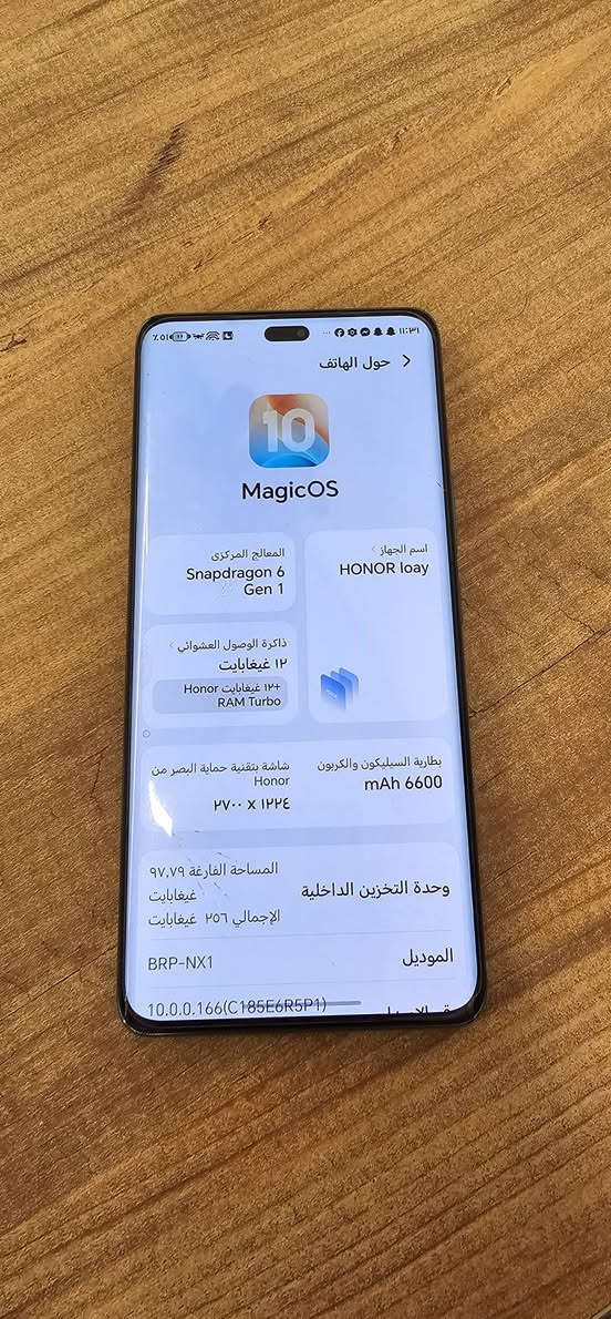 Honor x9c
بلادي نظيف جدا استعمال ثانوي بطاريته خرافيه بالشحن ويا شاحنته الاصليه ذاكره ٢٥٦ 
رام ١٢
***********

نص مكتوب في الصور:
- 11:31 56% 5G 3 حول الهاتف MagicOS اسم الجهاز HONOR loay المعالج المركزي Snapdragon 6 Gen 1 ذاكرة الوصول العشوائي 12 غيغابايت 12 غيغابايت Honor RAM Turbo mAh 6600 بطارية السيليكون والكربون شاشة بتقنية حماية البصر من Honor 2700 x 1224 وحدة التخزين الداخلية المساحة الفارغة 97,79 غيغابايت الإجمالي 256 غيغابايت الموديل BRP-NX1 10.0.0.166(C185E6R5P1) النظام