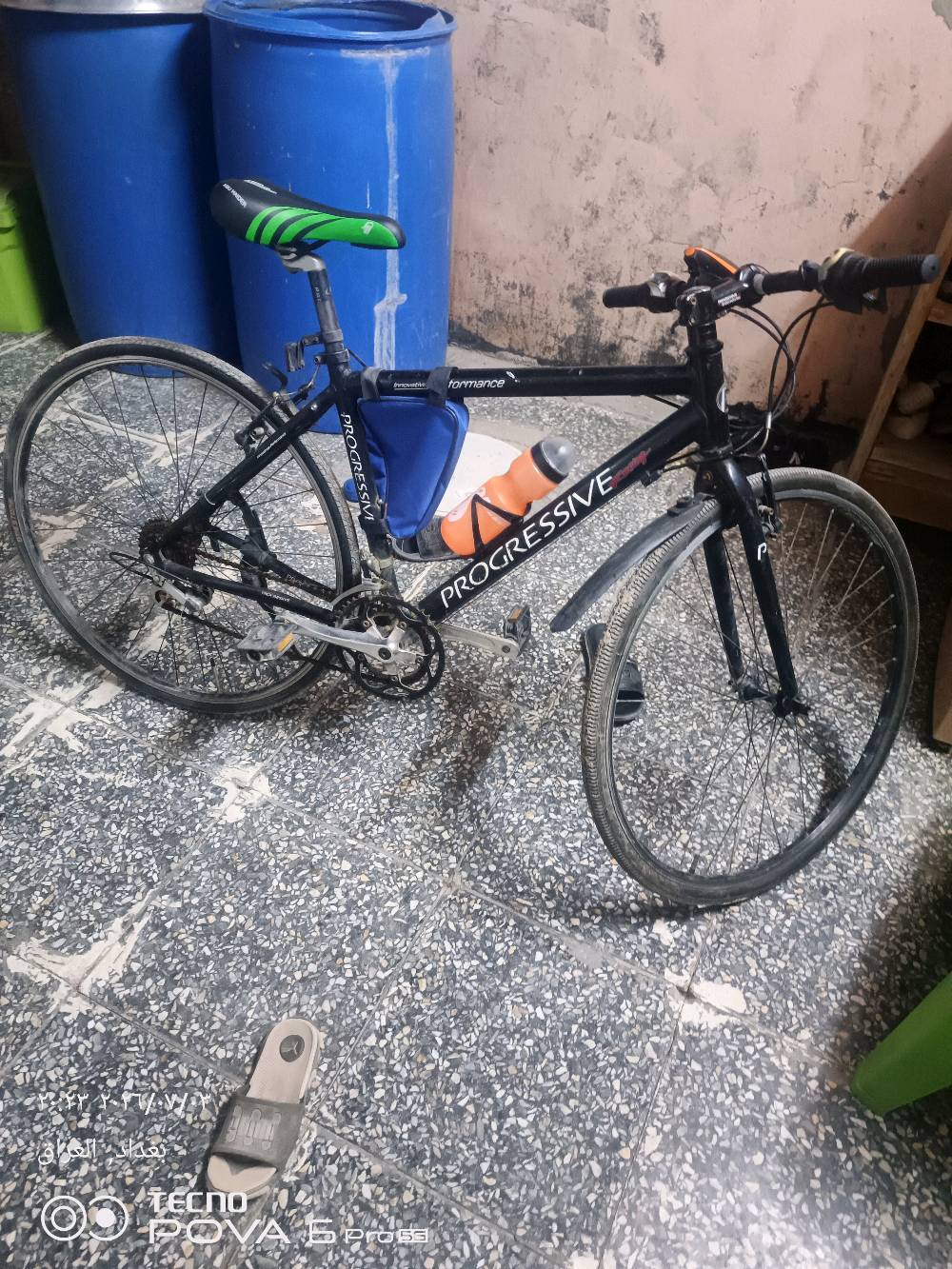 بايسكل هجين c700 نضافه 90٪ خامه المنيوم يعني أنسه شي اسمه زنجار 🚲🚲 عقرب جديد كلشي بي شغال انضف من الصوره كير شيمانو ماركه ياباني      PROGRESSIVEارجع وكول خامه المنيوم وزن خفيف ريشه بايسكل سباقات او اراضي صخريه، 👏 كشن رياضي خفيف المنيوم