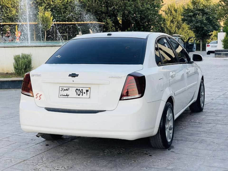 سەرەتا بەناوی خوودا 
ئۆپترا مۆدێل ٢٠٠٥ ئارم پلاستیک هەولێر بەشەرت ئارمو ئەوەلیات هەموو گیانی بەشەرت پارچەو نیوێکی بۆیاخ هەیە بێ لێدراو جام کارەبا گێڕ عادیە سەیارەکە تا بڵێی جوانو پاکە هی گەنجان بوە کامل جوانکاری بۆ کراوە بەگلایتی مارسلیسی بۆ دانراوە ٤ ویلو تاییەی ئینفنیتی لۆکی لە ژێرە تەقەو ڕەقە گێڕ مەکینە کارەبای موسو بڕاوە ئارمو ئەوەلیات بەشەرت سەیارەکە ٢٥٠ مەسرەفی نییە تەبریتو کارەبای گشت ئیش دەکات زۆر پاک ماوەتەوە 
شوێن کۆیە 
***********
*********** كويسينجاك, أربيل

