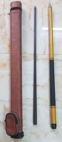 كيوب • مع الجَنطة