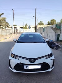 كورلا هايبرد • ٢٠٢٥ • مكفولة صبغ وتبديل