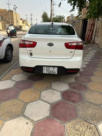 كيا ريو وارد امريكي موديل 2016 رقم بغداد ماشيه 88 الف حادث امريكا تبدي...
